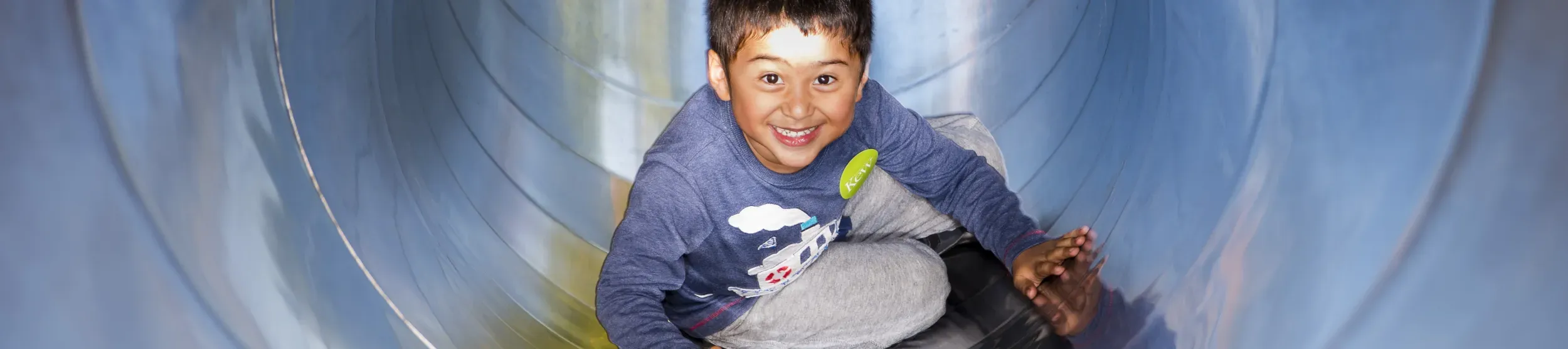Child playing in the Children's Garden at Kew Gardens