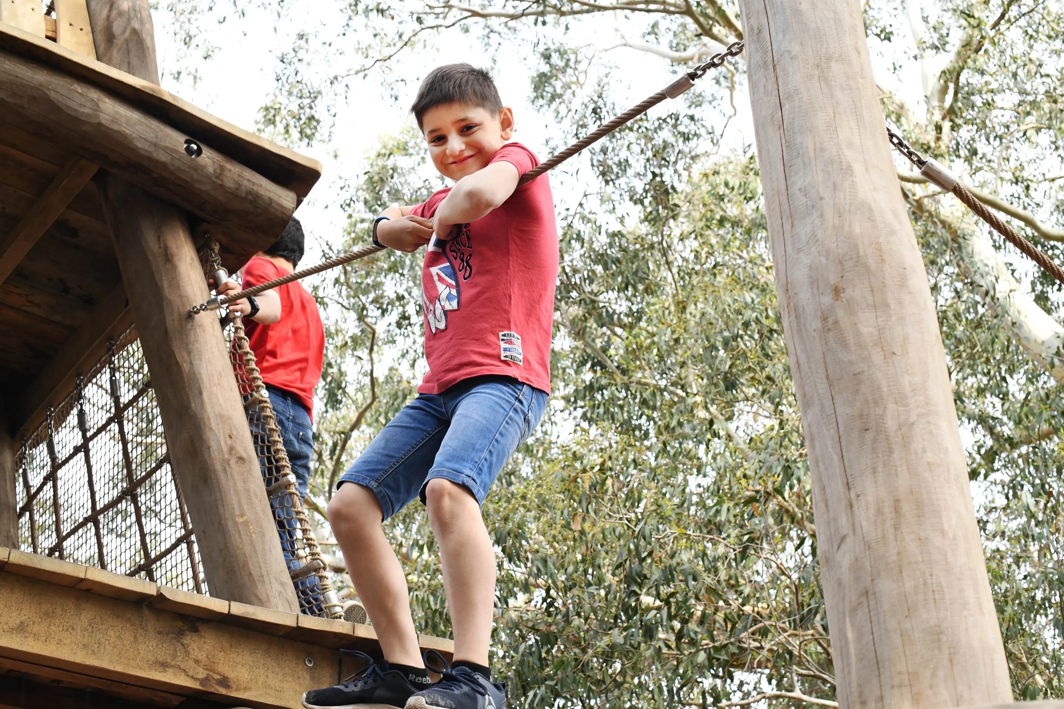 Boy playing in the Children's Garden