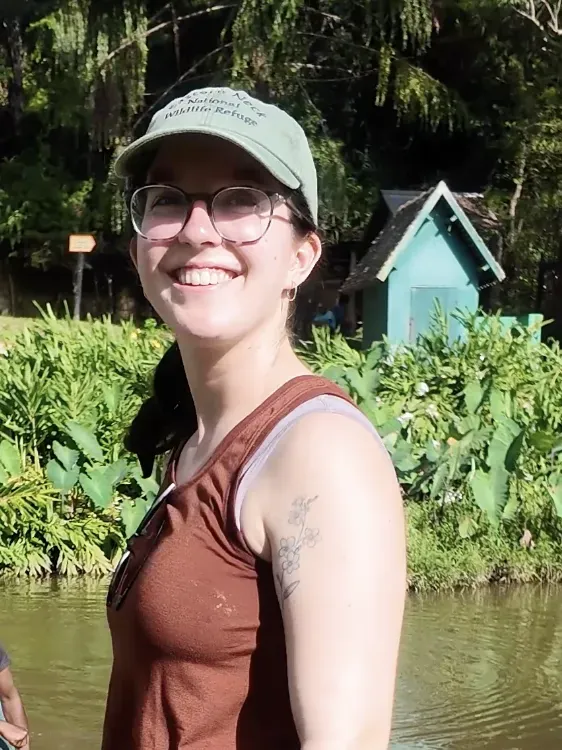 A person standing on a dock
